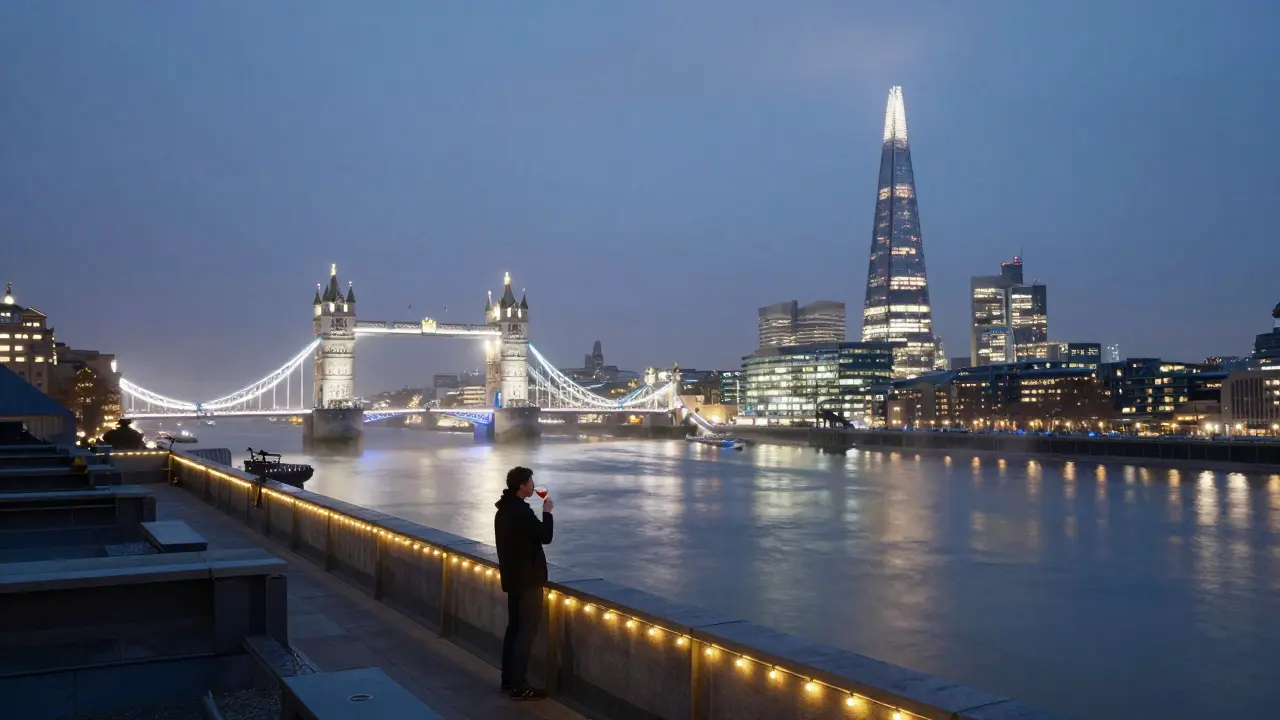 Silhouette on a rooftop overlooking London’s glittering skyline at night.