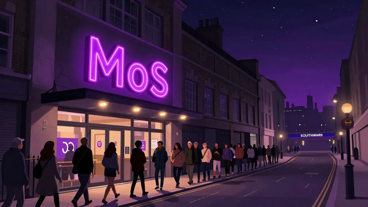 Long queue of people outside Ministry of Sound at night, neon MoS sign glowing, Southwark tube station in distance.
